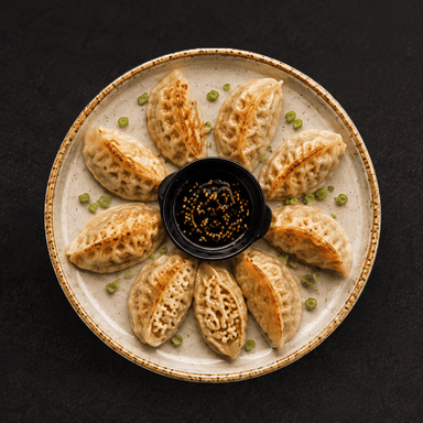 Gyoza con pollo curry y salsa teriyaki/picante