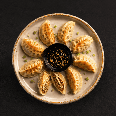 Gyoza con pato y salsa teriyaki/picante