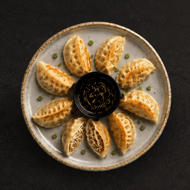 Gyoza con cerdo y salsa teriyaki/picante